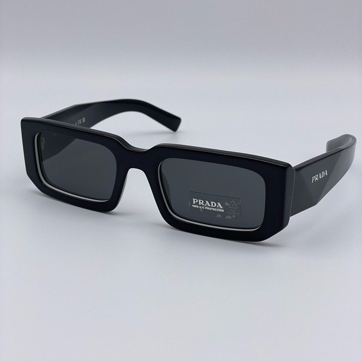 Prada Sunglasses PR06YSF 09Q5S0 Black White/Dark Grey Unisex