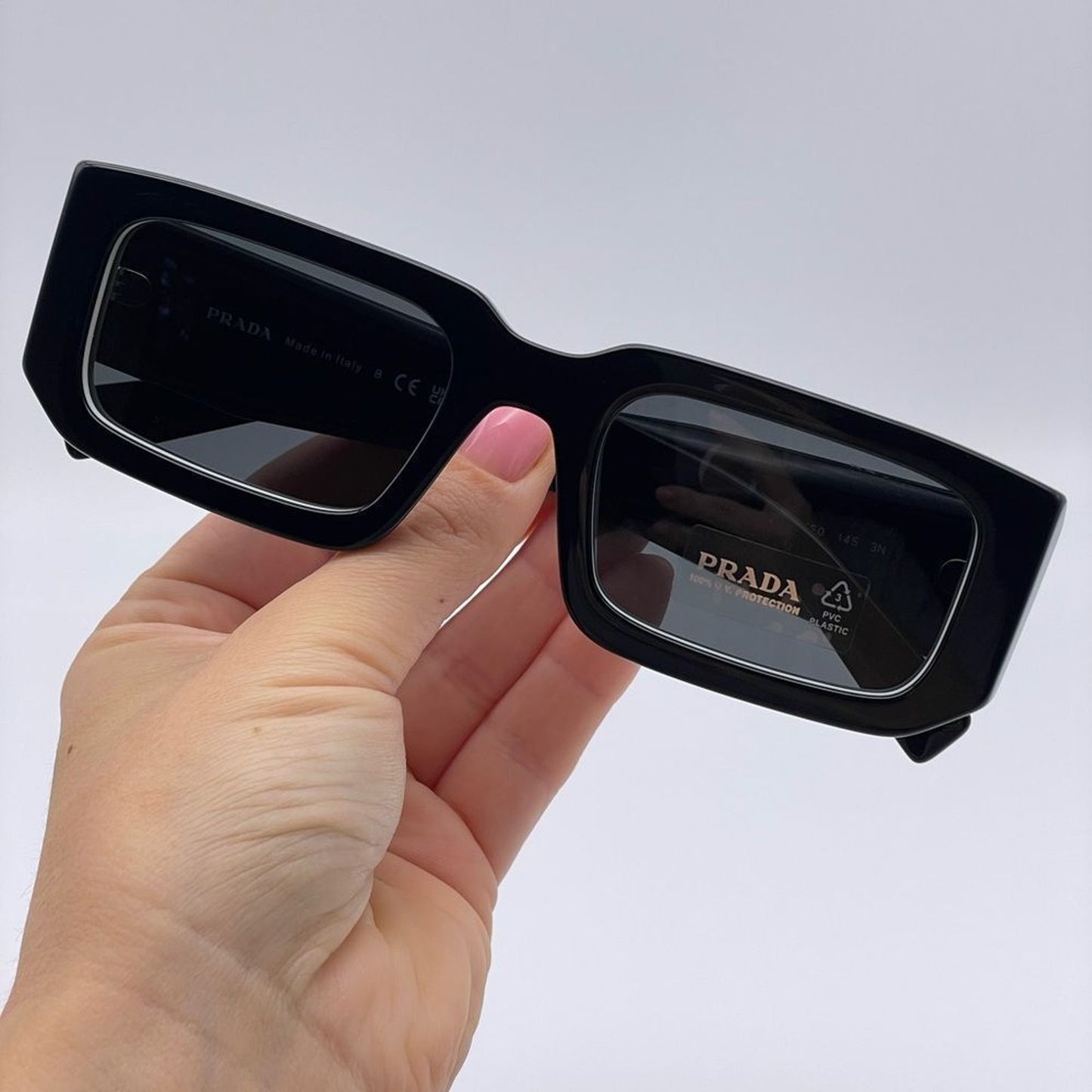 Prada Sunglasses PR06YSF 09Q5S0 Black White/Dark Grey Unisex