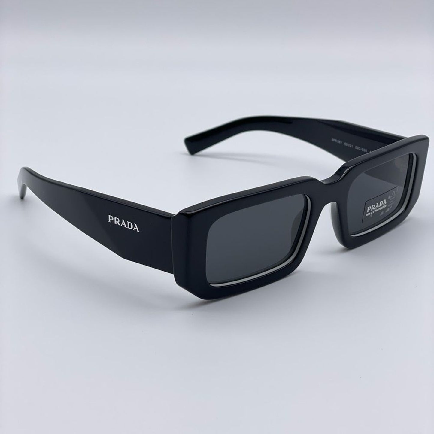 Prada Sunglasses PR06YSF 09Q5S0 Black White/Dark Grey Unisex