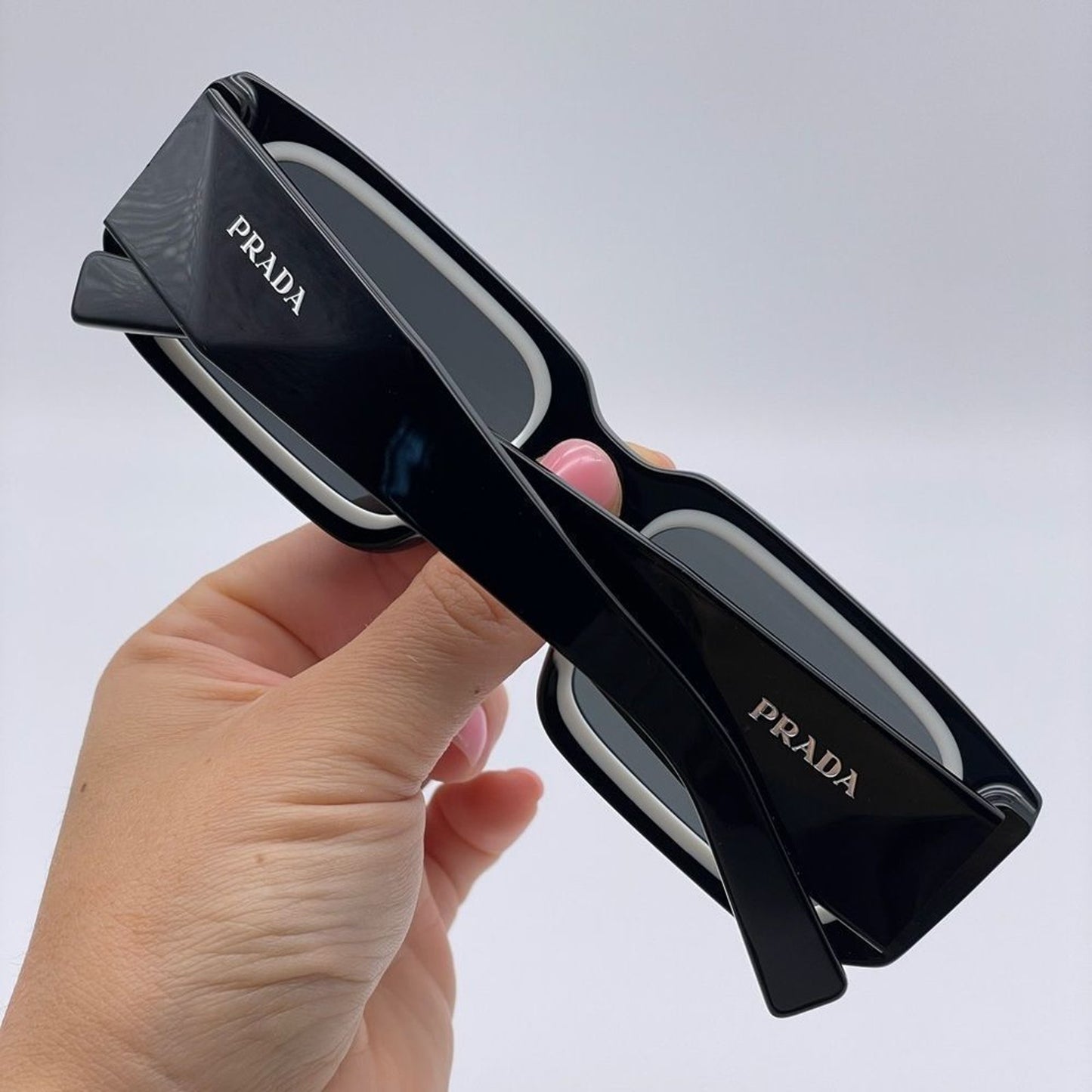 Prada Sunglasses PR06YSF 09Q5S0 Black White/Dark Grey Unisex